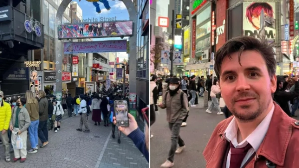 Вулиця в Токіо, де люди ходять і стоять у черзі, щоб увійти до магазину, і наш письменник Том Персіваль робить селфі на перехресті в Сібуї.