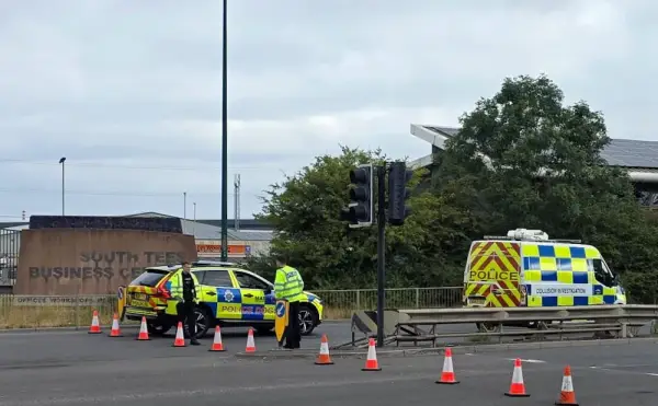 BGUK_3663674 - Middlesbrough, UNITED KINGDOM Multiple people dead after police car and Volkswagen collide on road in early hours of morning. The vehicle collided with a Volkswagen Passat on the A66 in South Bank, near Middlesbrough in Teesside, at around 3.40am. North East Ambulance Service said the 'serious' crash involved three vehicles and a 'number of patients died at the scene. The number of fatalities is yet to be confirmed and police are working to identify the victims. The A66 is closed in both directions between Normanby Road and Church Lane and is expected to remain shut 'for some time', Cleveland Police said. A large number of emergency service vehicles are at the scene and motorists are being urged to use alternative routes. Pictures show police at the road closure Pictured: GV - A66 Southbank, Teesside BACKGRID UK 22 AUGUST 2026 BYLINE MUST READ: BACKGRID UK: +44 208 344 2007 / uksales@backgrid.com USA: +1 310 798 9111 / usasales@backgrid.com *Pictures Containing Children Please Pixelate Face Prior To Publication*