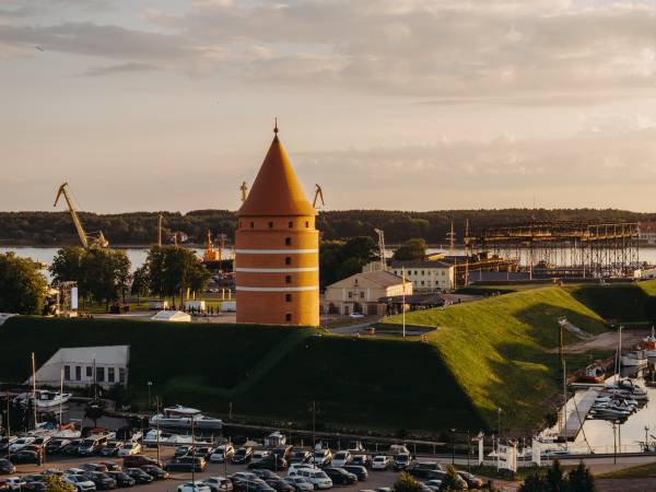 The restored tower of Klaipeda Castle, with modern materials and historical dimensions.