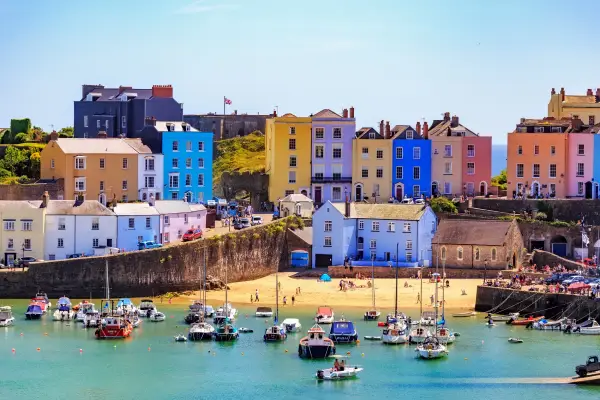 TENBY, WALES - June 18th 2017: Beautiful summer sunshine and warm weather drew visitors to the beach Tenby, Wales.