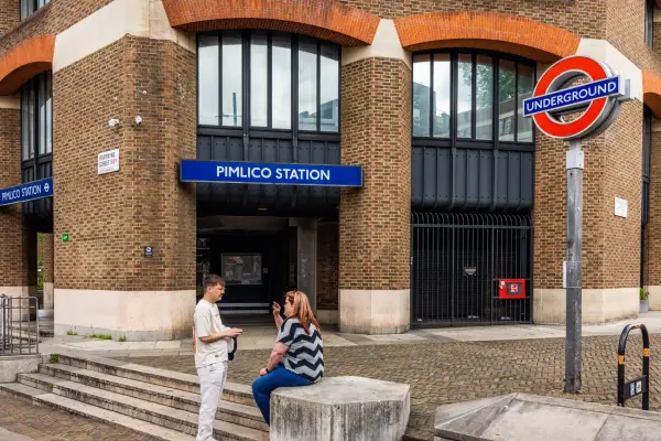 Pimlico is a London Underground station in Pimlico, City of Westminster, on the Victoria line between Victoria and Vauxhall stations in fare zone 1. A couple at the entrance of the station. Shot on 8 June 2024.