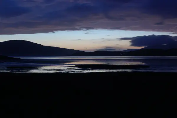 Шотландська сауна з найкращими краєвидами Британії 15 Dusk at Luskentyre Isle of Harris, Scotland. Looking west towards Taransay. Taken with long exposure. Large dark area in foreground for possible text use. Smoothing flowing effect of sea and clouds.