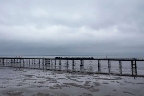 SOUTHEND, ENGLAND - OCTOBER 18: The train makes its way along Southend Pier, the longest pleasure pier in the world, on October 18, 2021 in Southend, England. The campaign to make Southend-on-Sea a city was a cause long championed by its MP, Sir David Amess, who was fatally stabbed during a constituency meeting on Friday. The Queen has agreed to grant city status to Southend following the MP's death. (Photo by Dan Kitwood/Getty Images)