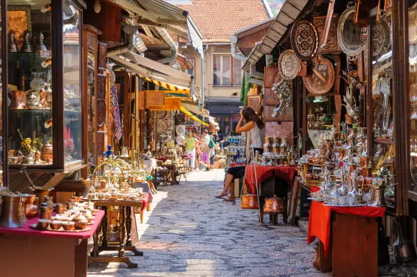 SARAJEVO, BOSNIA AND HERZEGOVINA - SEPTEMBER 4, 2009: Street with shops selling souvenirs at Bascarsija in the old city district; Shutterstock ID 417874177; purchase_order: -; job: -; client: -; other: -