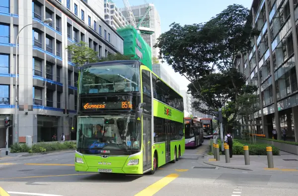 Singapore - November 15, 2018: Public bus drive through downtown Singapore.