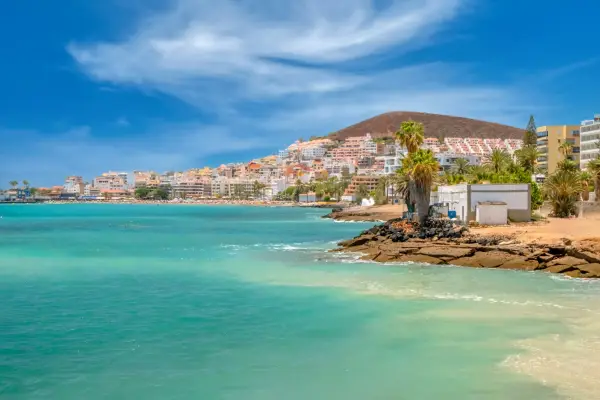Bay of turquoise coloured water in Los Cristianos, Tenerife, Canary Islands, Spain.