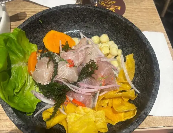 A combination of plantain chips, sweet potato and raw rish, ceviche appears on menus accross South America (Picture: Adam Miller)