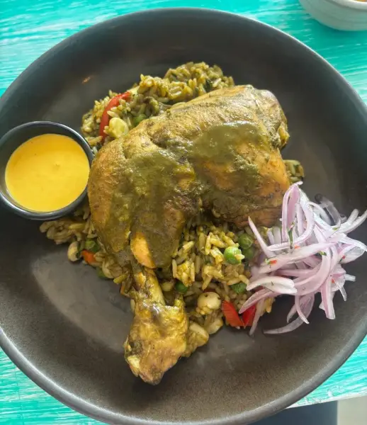 Traditional chicken and rice dishes can be found around Peru (Picture: Adam Miller)