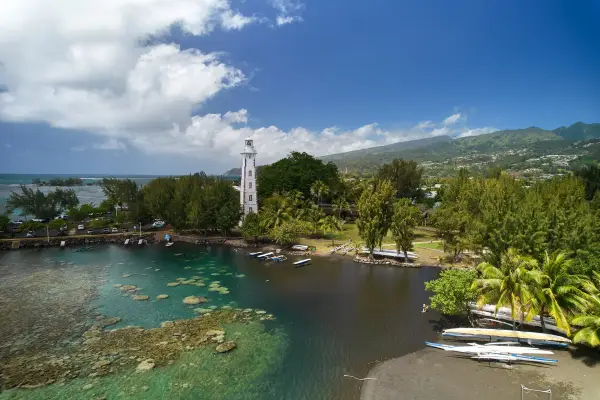 A sunny aerial view of Venus Point and Lighthouse in Tahiti.