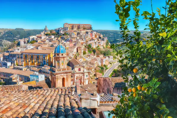 A bright sunrise over the old baroque town of Ragusa Ibla in Sicily.